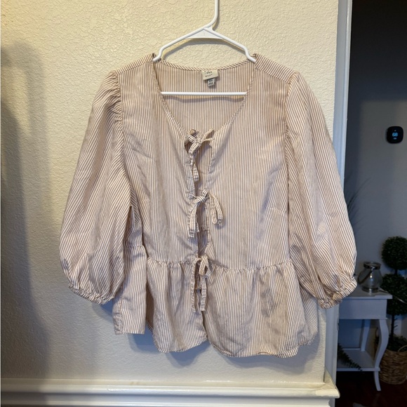 XXL Puff 3/4 Sleeve Tie-Front
Blouse - A New Day Striped - Picture 3 of 14